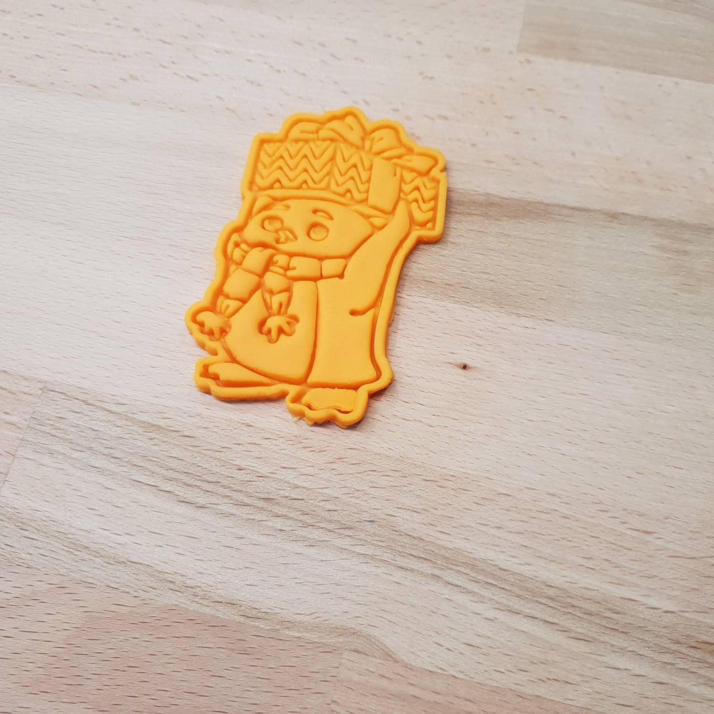 Penguin holding gift above head - Christmas cookie cutter - just-little-luxuries