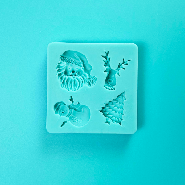 'Festive Christmas Icon Silicone Mould for Holiday Baking,' 'Assorted Christmas Shapes Mold,' 'Durable and Versatile Christmas Mould.'