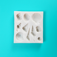 'Seashell Icon Silicone Mould for Coastal Baking,' 'Assorted Seashell Shapes Mold,' 'Durable and Versatile Seashell Mould.'