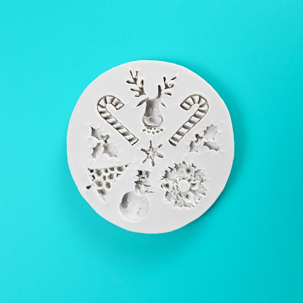 'Festive Christmas Icon Silicone Mould for Holiday Baking,' 'Assorted Christmas Shapes Mold,' 'Durable and Versatile Christmas Mould.'