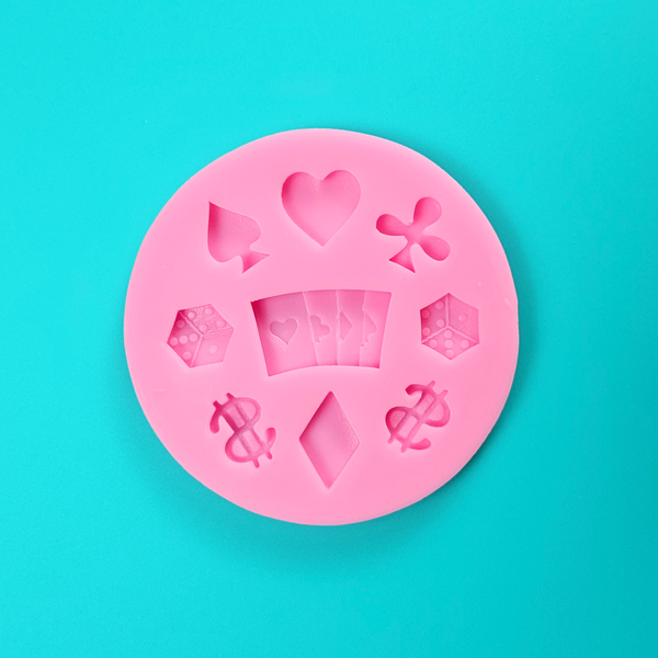  'Casino Themed Silicone Mould for High-Stakes Baking,' 'Assorted Casino Designs Mold,' 'Durable and Versatile Casino Mould.'