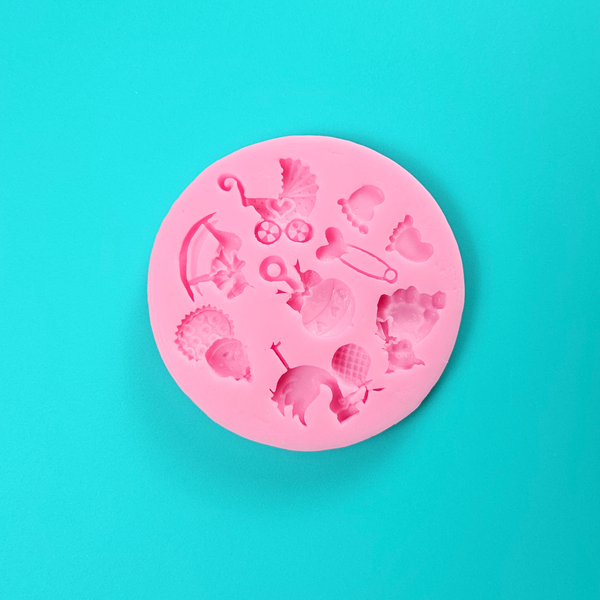  'Baby Themed Silicone Mould for Heart warming Baking,' 'Assorted Baby Designs Mould,' 'Durable and Versatile Baby Mould.'