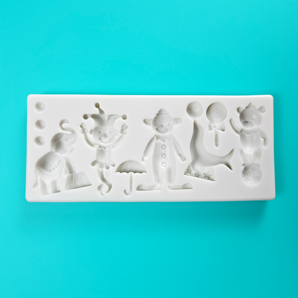  'Circus Themed Silicone Mold for Whimsical Baking,' 'Assorted Circus Designs Mold,' 'Durable and Versatile Circus Mould.'