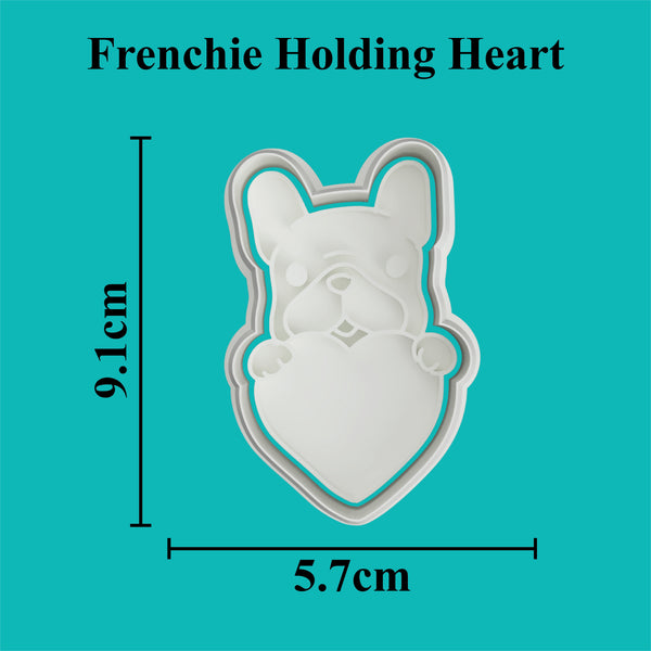 French Bulldog Holding Heart