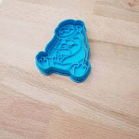 Penguin sitting holding gift - Christmas cookie cutter - just-little-luxuries